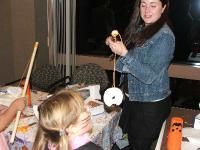 abbott 2006 kid halloween party - klea eating donut on string 